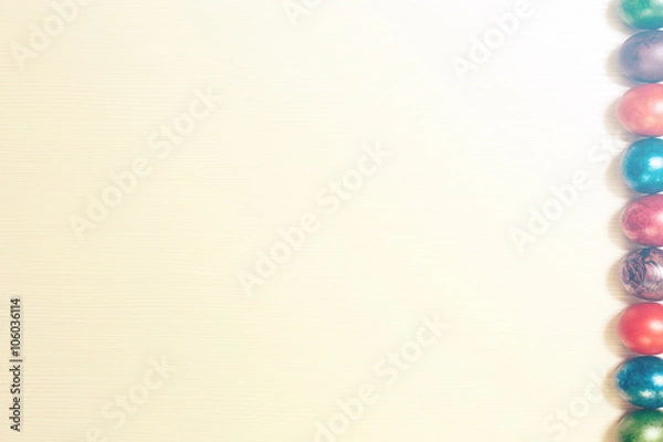 Obraz Easter eggs isolated on white wooden background