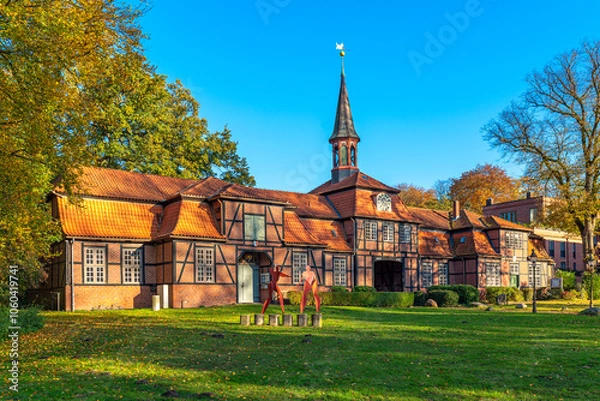 Fototapeta The gatehouse of Wellingsbüttel manor, built in 1757, in the Alster valley in a district of northern Hamburg. Today the historical building contains the Alstertal museum 