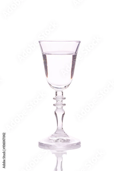 Fototapeta the glass of vodka on white background