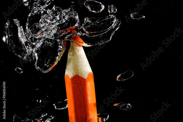 Fototapeta Crayon under water with bubbles of air.