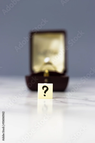Obraz Engagement ring with question mark