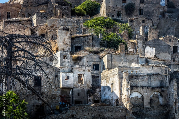 Fototapeta Abandoned ruins of the ghost town of Craco. A city abandoned due to an earthquake in the late 20th century. Province of Matera, Basilicata, Italy