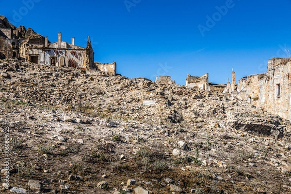 Fototapeta Abandoned ruins of the ghost town of Craco. A city abandoned due to an earthquake in the late 20th century. Province of Matera, Basilicata, Italy