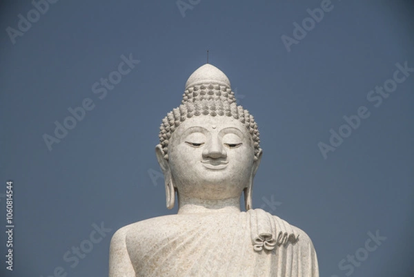 Fototapeta close up of big white buddha in phuket, thailand, with blue sky