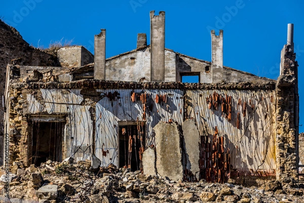 Fototapeta Abandoned ruins of the ghost town of Craco. A city abandoned due to an earthquake in the late 20th century. Province of Matera, Basilicata, Italy