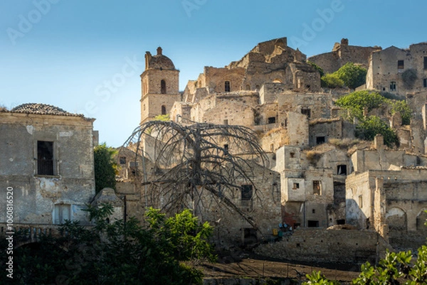 Fototapeta Abandoned ruins of the ghost town of Craco. A city abandoned due to an earthquake in the late 20th century. Province of Matera, Basilicata, Italy