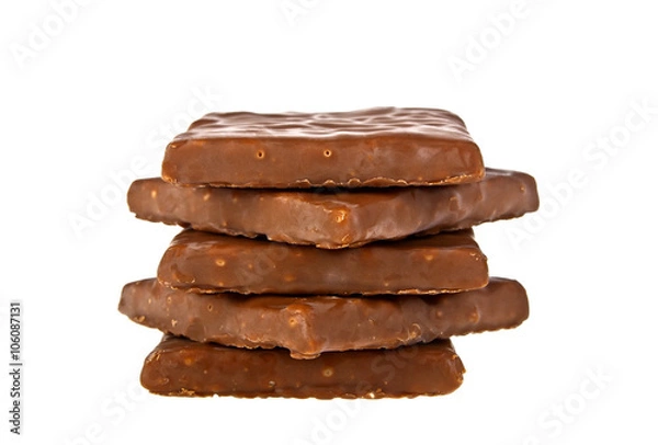 Fototapeta Chocolate blocks stack on white background