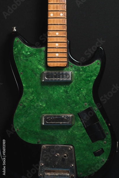Obraz electric guitar without strings on wooden background