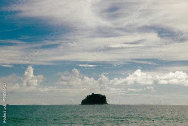 Fototapeta view of the sea in the middle there is a small island