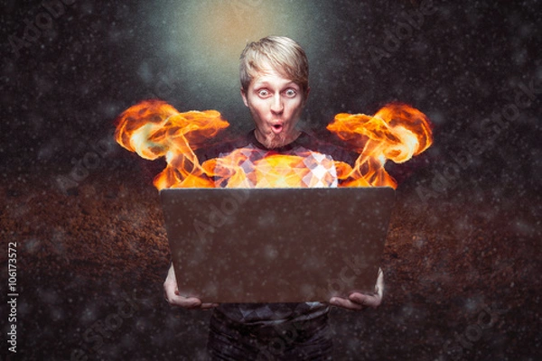 Fototapeta Burning Computer In Outer Space