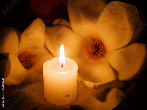 Obraz Lit candle with flower