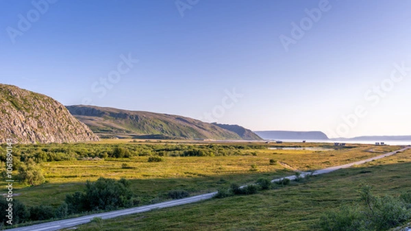 Fototapeta Picturesque landscapes of Northern Norway near Molvik, Finnmark, Norway with mountains, lake and fjords around