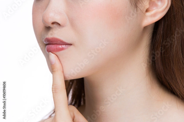 Fototapeta 唇を指差す女性