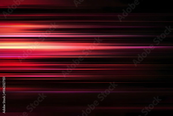 Fototapeta The effect of red light in fast motion on a black background. blurred abstract background with long exposure. neon light