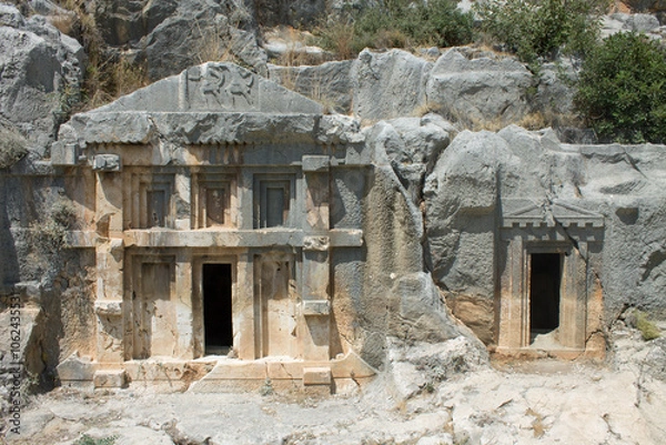 Obraz Lycian tombs in Turkey in the rocks on a sunny summer day