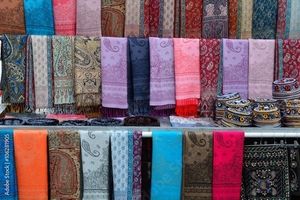 Fototapeta Silk scarves for sale in Baku's Old City, Azerbaijan. Scarf making is a traditional craft dating back hundreds of years in Azerbaijan, often with bright and colourful design
