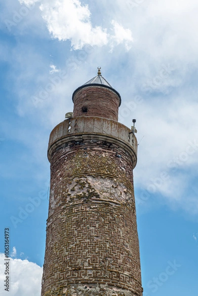 Fototapeta  Harput Grand Mosque. Grand Mosque (Ulu Cami) and Curved Minaret in Harput, Elazig, Turkey. Harput Ulu Mosque was built in the 12th century during the Anatolian Seljuk period. Elazığ, Türkiye.