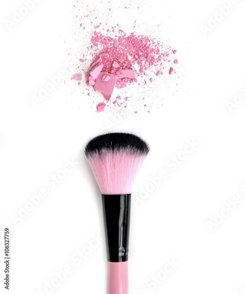 Fototapeta Close up of crushed blush on white background and cosmetic brush