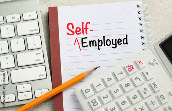 Fototapeta koncepcja samozatrudnionych z tłem biurka