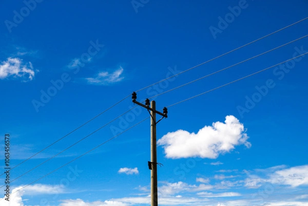 Fototapeta an electric pole in sunny weather