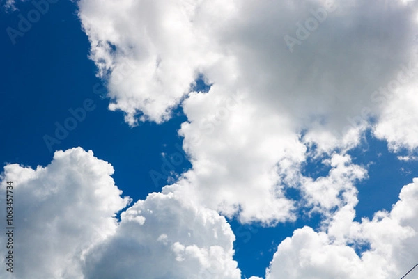 Fototapeta white clouds covering the blue sky