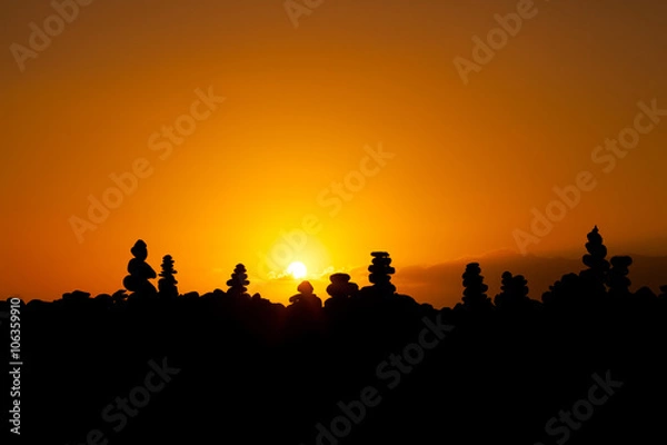 Obraz Sunset with stone piles Tenerife