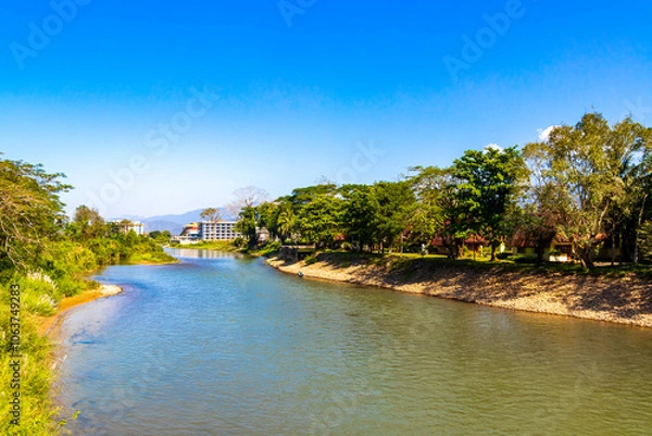Fototapeta Mountain landscape with river lake water in Vang Vieng Laos.