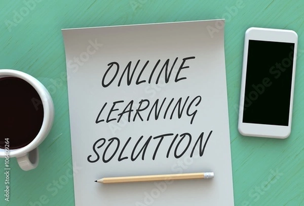 Fototapeta ONLINE LEARNING SOLUTION, message on paper, smart phone and coffee on table