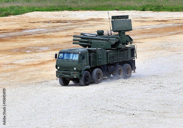 Fototapeta Weapons of anti aircraft defense system "Pantsir S1" on a march