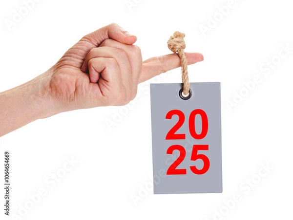 Obraz 2025 tag on thick rope hanging on finger