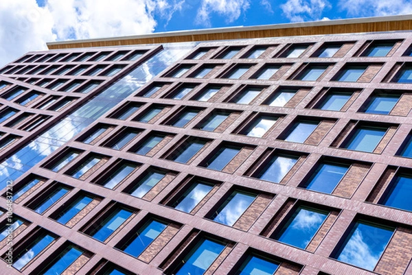 Fototapeta A Modern Style Building Within A City To Offer Accommodation Or Office Spaces