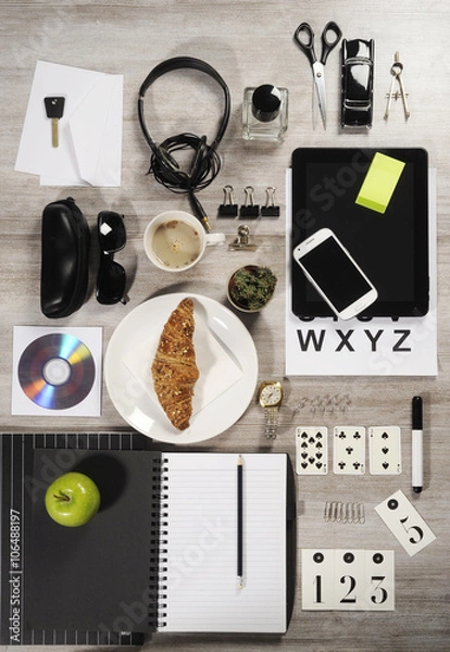 Fototapeta Manager business tabletop with office objects on a wooden table