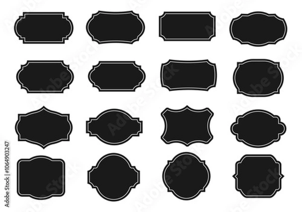 Fototapeta A set of vintage labels and badges in different shapes. Vector illustration. A black template with a white frame for patches, insignia, and overlays.