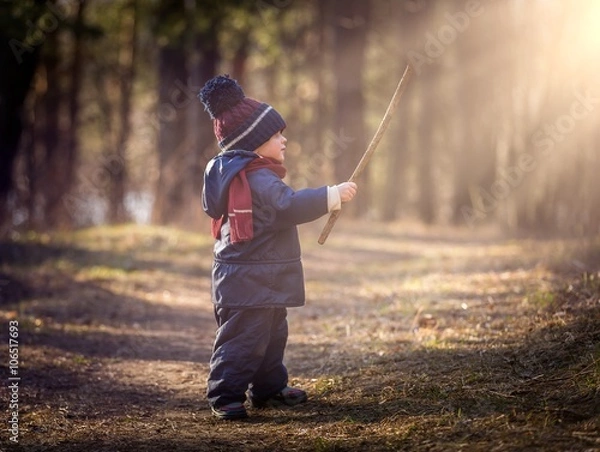 Obraz Caucasian boy playing outdoor at springtime