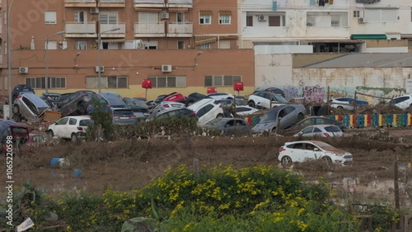 Fototapeta Multiple cars piled up after DANA in Valencia disaster