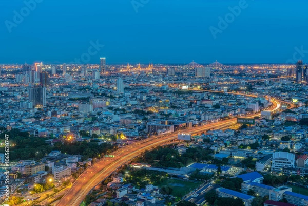Obraz evening city lights and blue sky