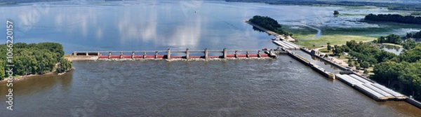Obraz Panorama  of Locks and Dam 13 on the Mississippi river at Fulton, IL loading the lock so a barge can proceed down river.