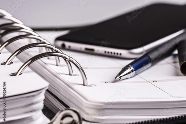 Obraz planning concept - calendar, cellphone, pen