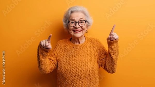 Fototapeta Photo of satisfied optimistic pretty glad grandma pointing at herself boasting about handmade knitted seasonal jumper isolated bright color background