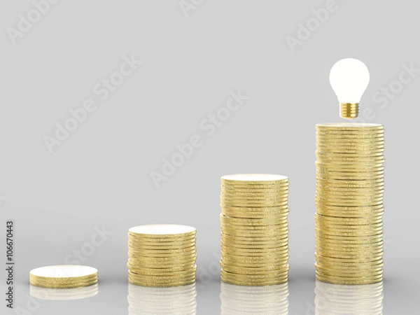 Fototapeta business success idea with stack of golden coins and idea light bulb