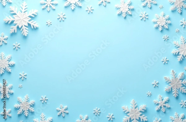 Fototapeta White snowflakes around an empty blue background. Merry Christmas and Happy Holidays greeting card, postcard with copy space inside