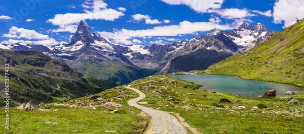 Obraz Popular hiking routes in Switzerland, Valais canton - five most beautiful mountain lakes in Zermatt. Panoramic view of Stellisee lake and Matterhorn iconic mountain