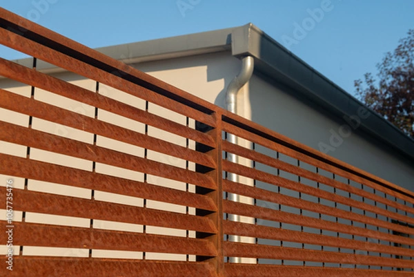 Fototapeta corten steel grate, suitable for contemporary architecture projects, for industrial design and resistance to atmospheric agents. example of a modern divider and shading suitable for multiple design.