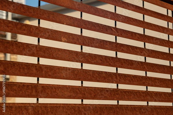 Fototapeta corten steel grate, suitable for contemporary architecture projects, for industrial design and resistance to atmospheric agents. example of a modern divider and shading suitable for multiple design.