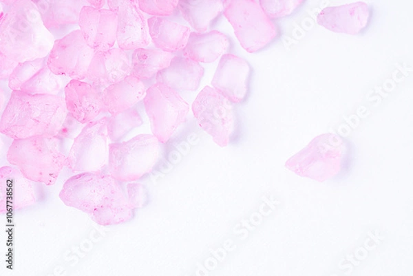 Obraz Pink bath salt on white background, macro