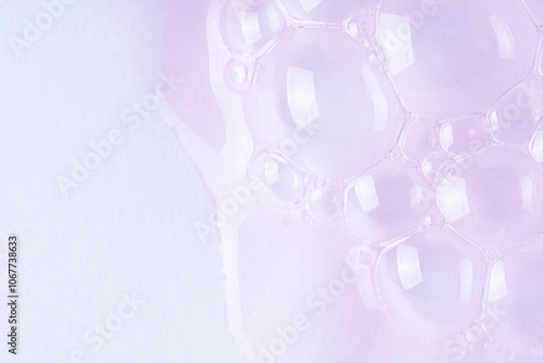 Obraz Clear pink cosmetic gel with molecule bubbles on white background