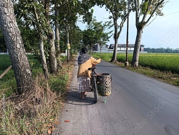 Obraz person riding a bicycle
