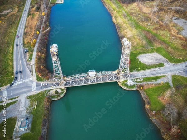 Obraz Aerial of the Glendale Avenue Bridge, a vertical lift bridge over the Welland Canal, part of the St. Lawrence Seaway and Great Lakes Waterway in St. Catharines, Ontario, Canada. Between locks 3 and 5.