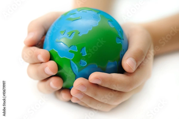 Fototapeta Earth in a children's hands isolated on white background