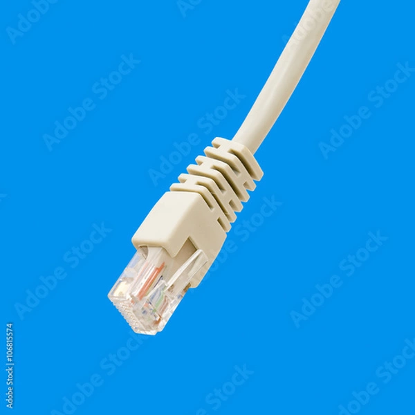 Fototapeta White ethernet cable on light blue background